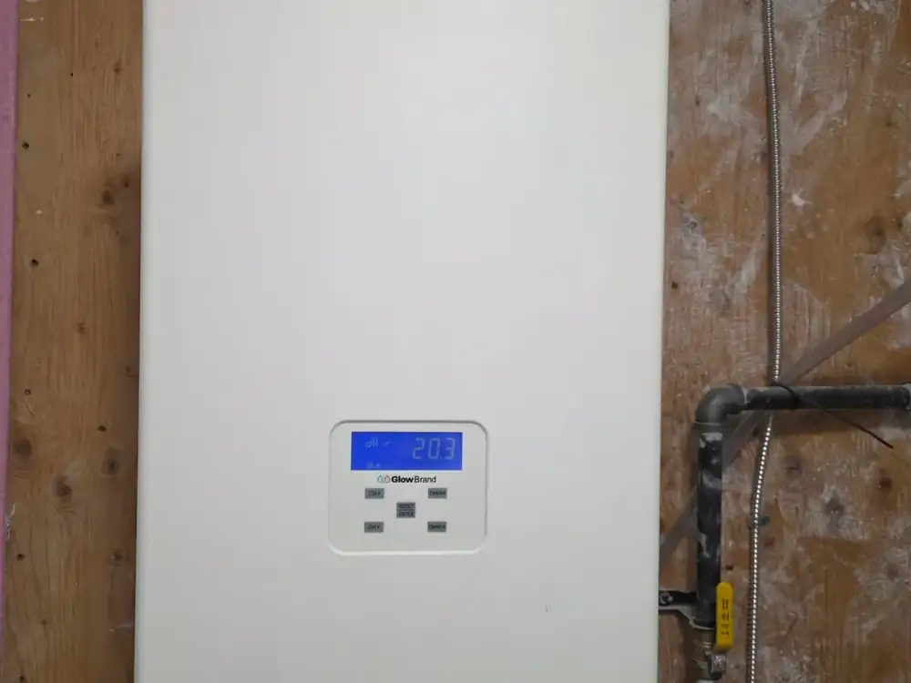 Wall-mounted high-efficiency combi boiler installed in a Simcoe County home